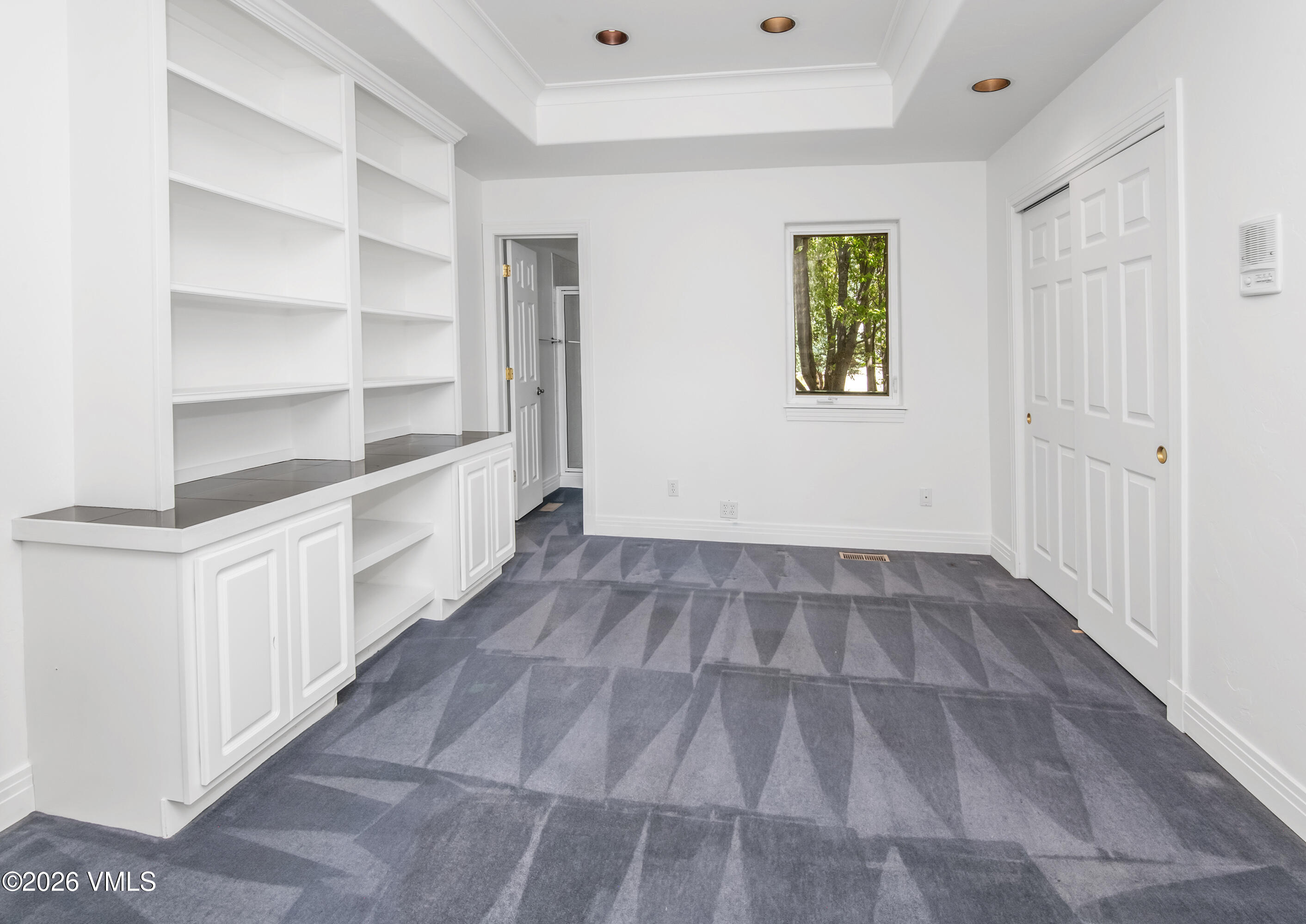 471 Rawhide Road Edwards, CO 81632 - Photo 23 of 51 a view of a hallway with wooden floor and entryway