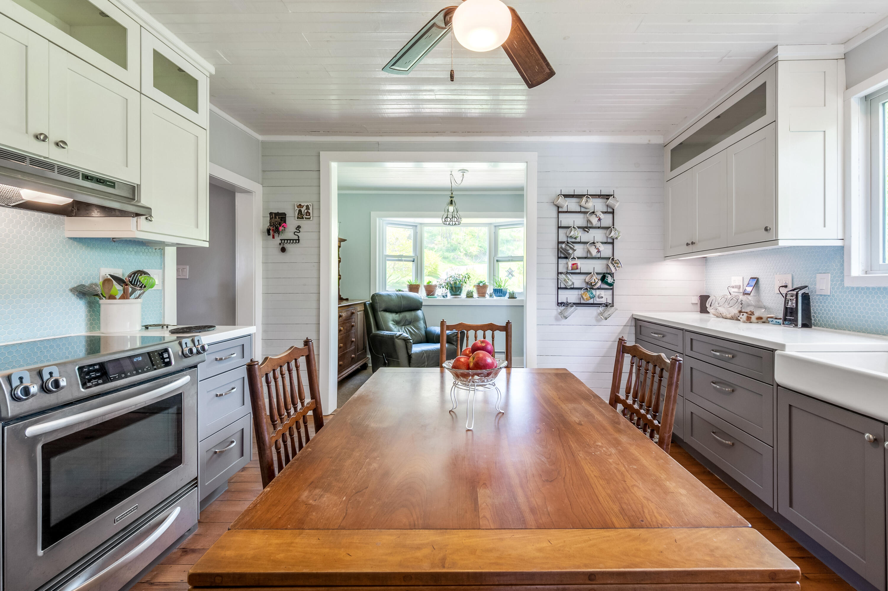771 White Oak Grove Road Northeast Riner, VA 24149 - Photo 20 of 113 a kitchen with stainless steel appliances granite countertop a stove top oven a sink dishwasher and cabinets with wooden floor