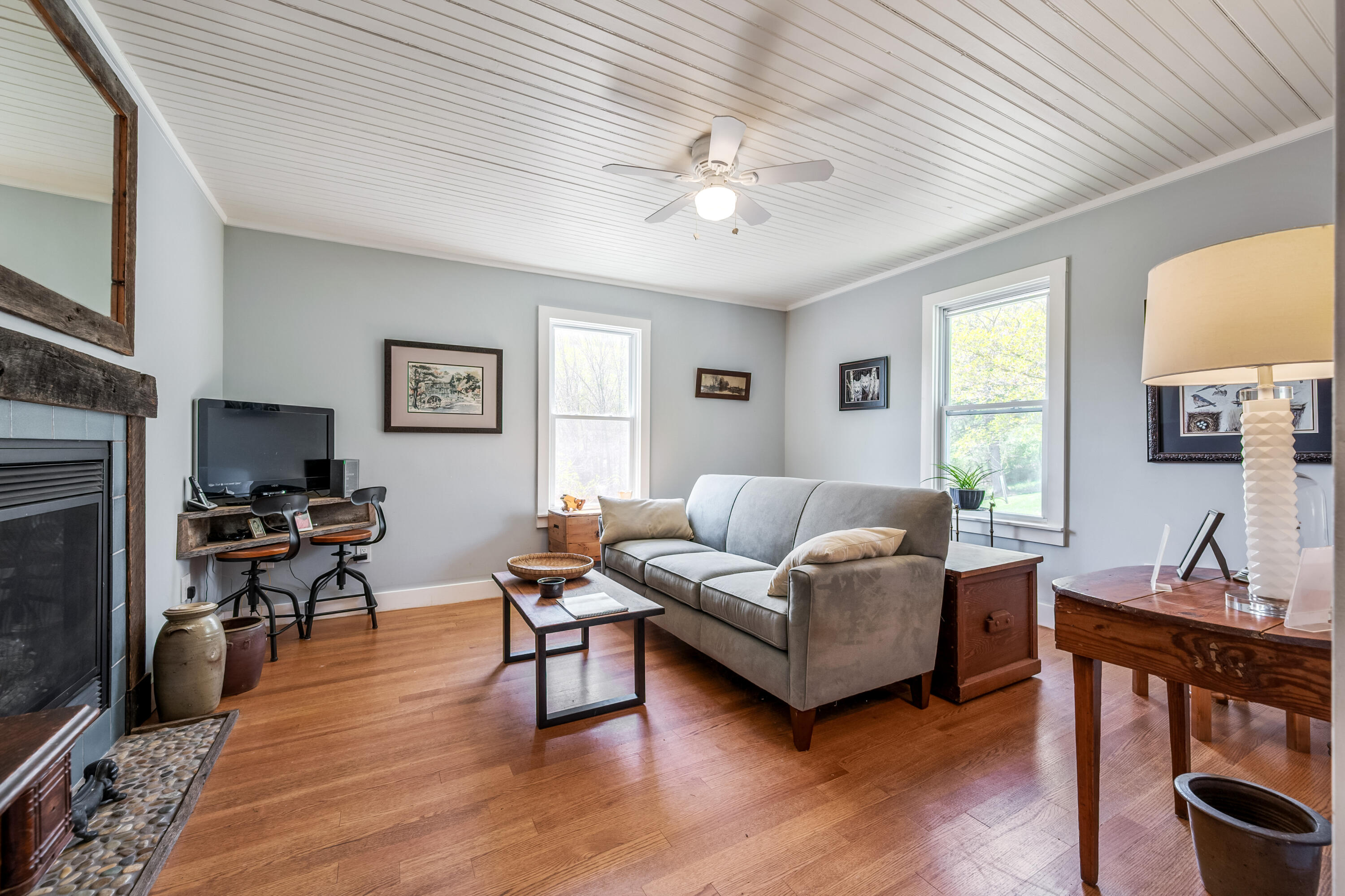 771 White Oak Grove Road Northeast Riner, VA 24149 - Photo 24 of 113 a living room with furniture and a flat screen tv