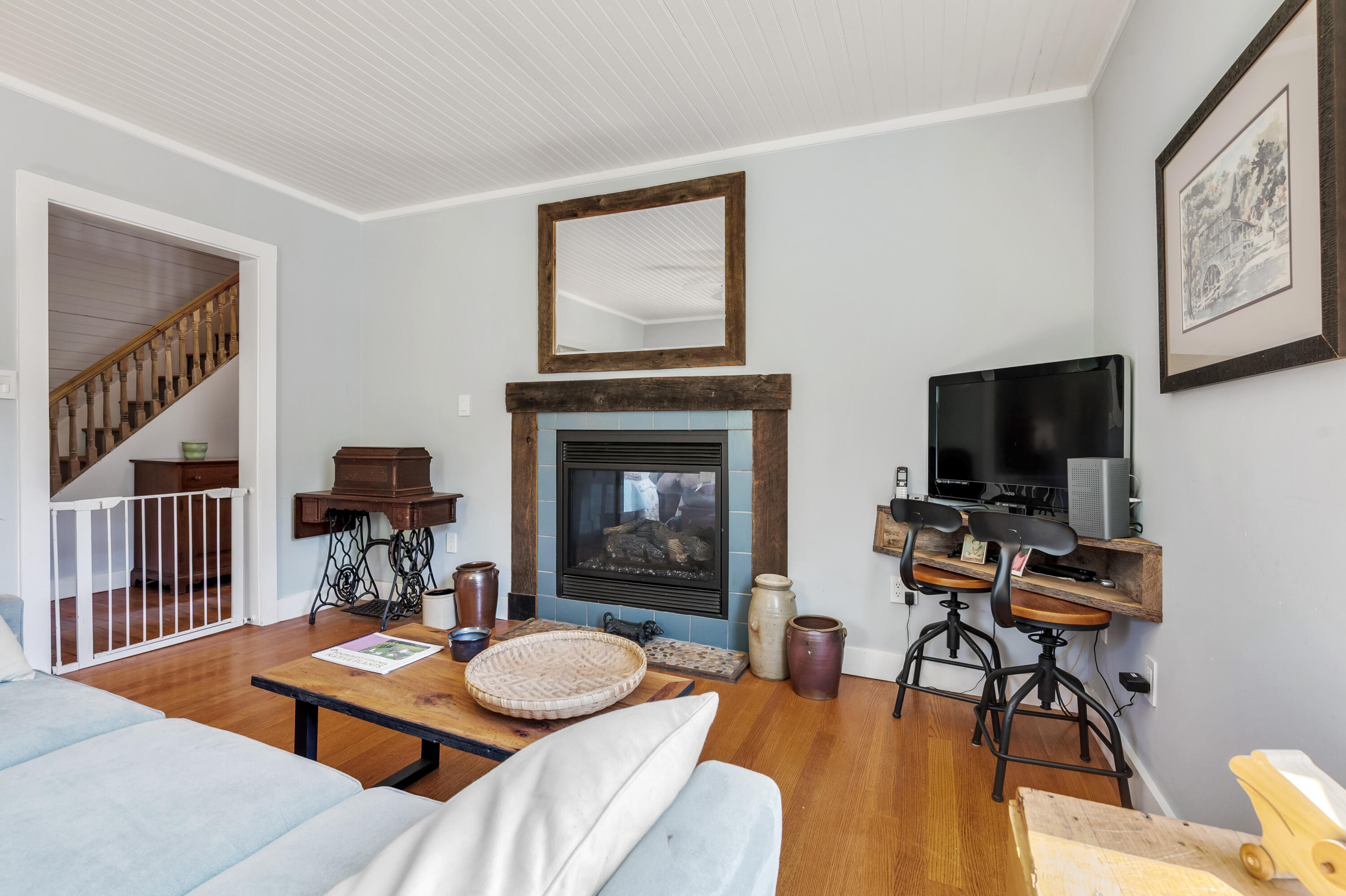 771 White Oak Grove Road Northeast Riner, VA 24149 - Photo 26 of 113 a living room with furniture a flat screen tv and a fireplace