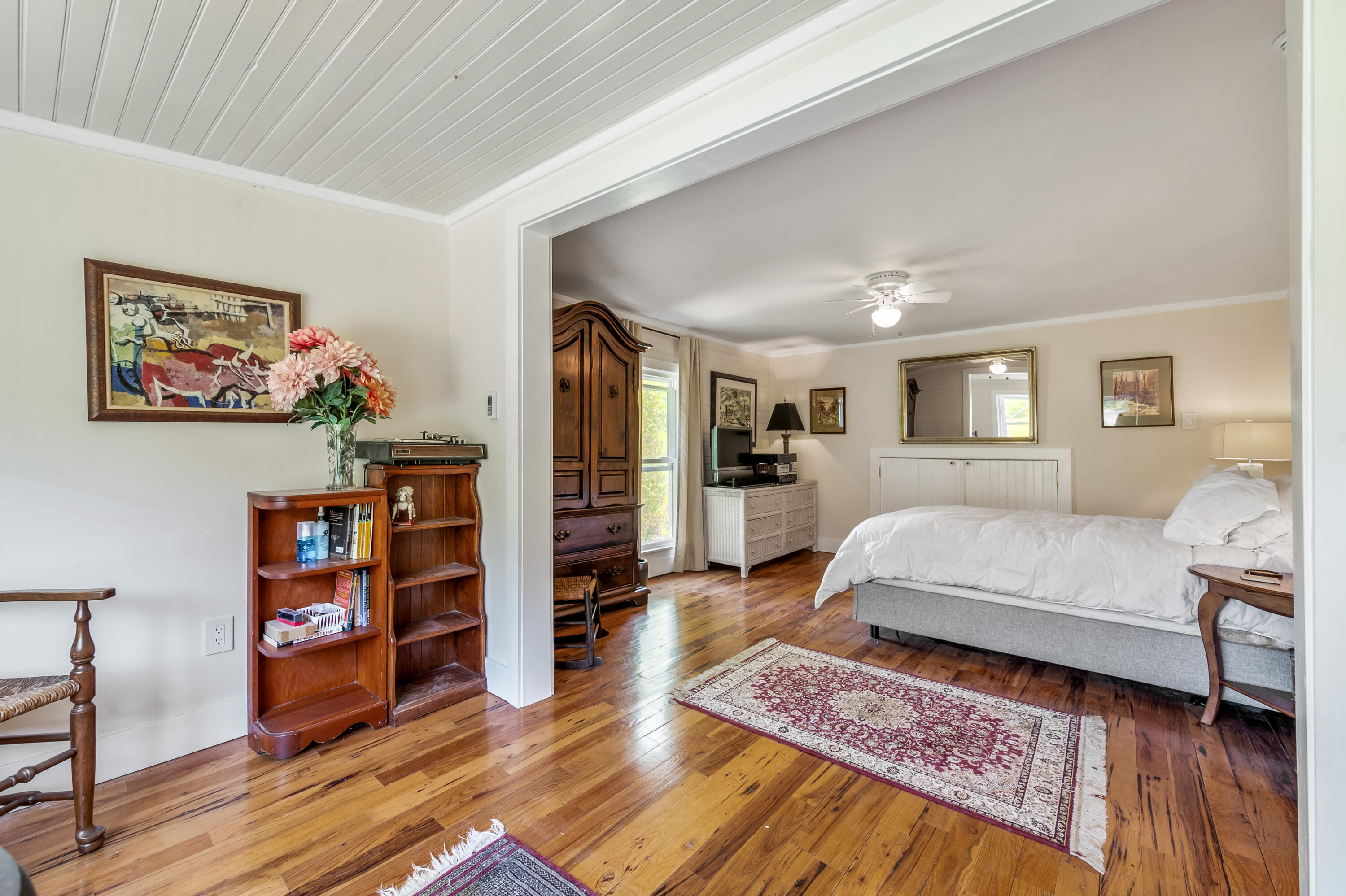 771 White Oak Grove Road Northeast Riner, VA 24149 - Photo 45 of 113 a living room with furniture and a book shelf