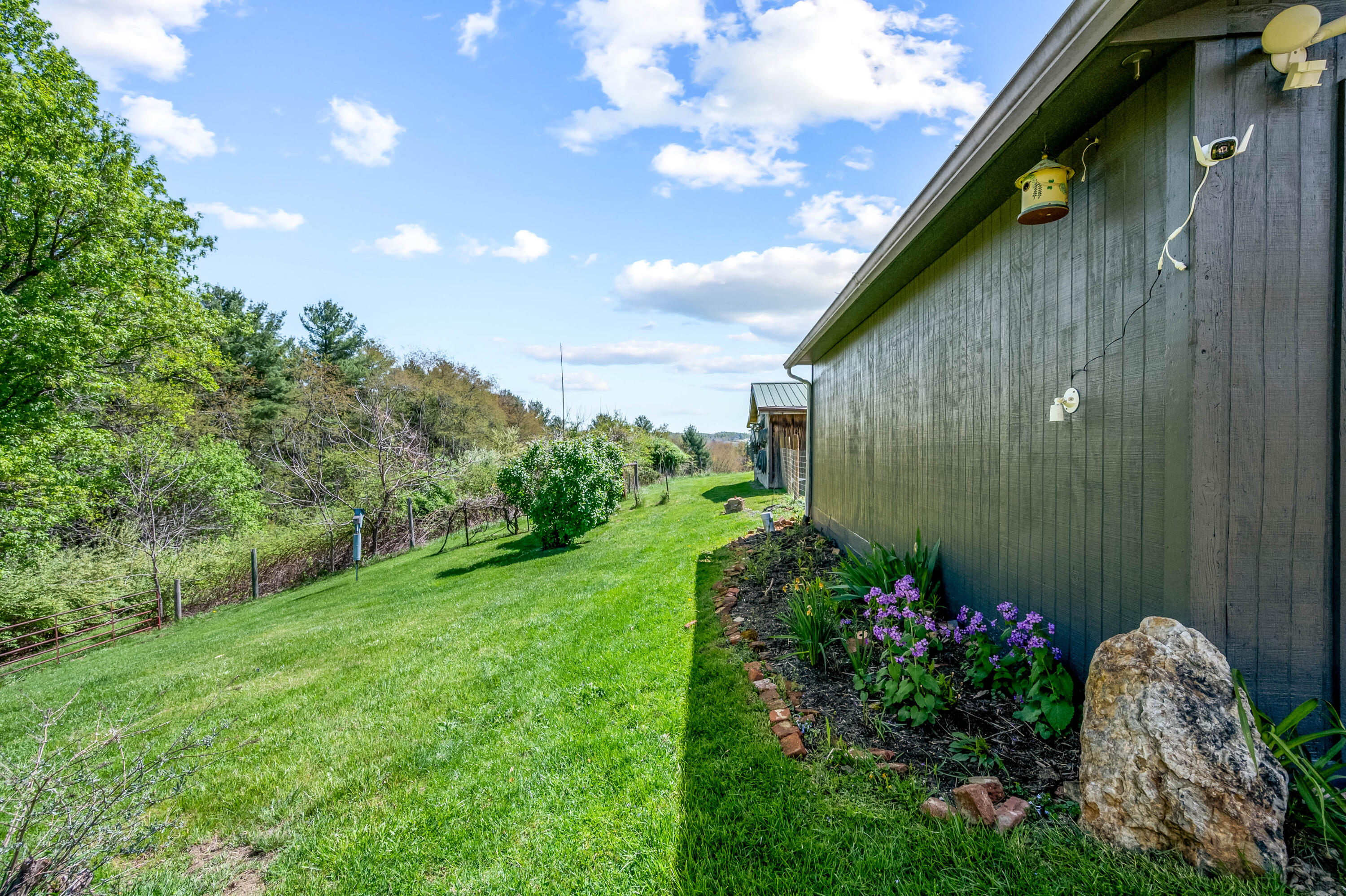 771 White Oak Grove Road Northeast Riner, VA 24149 - Photo 61 of 113 a backyard of a house with lots of green space