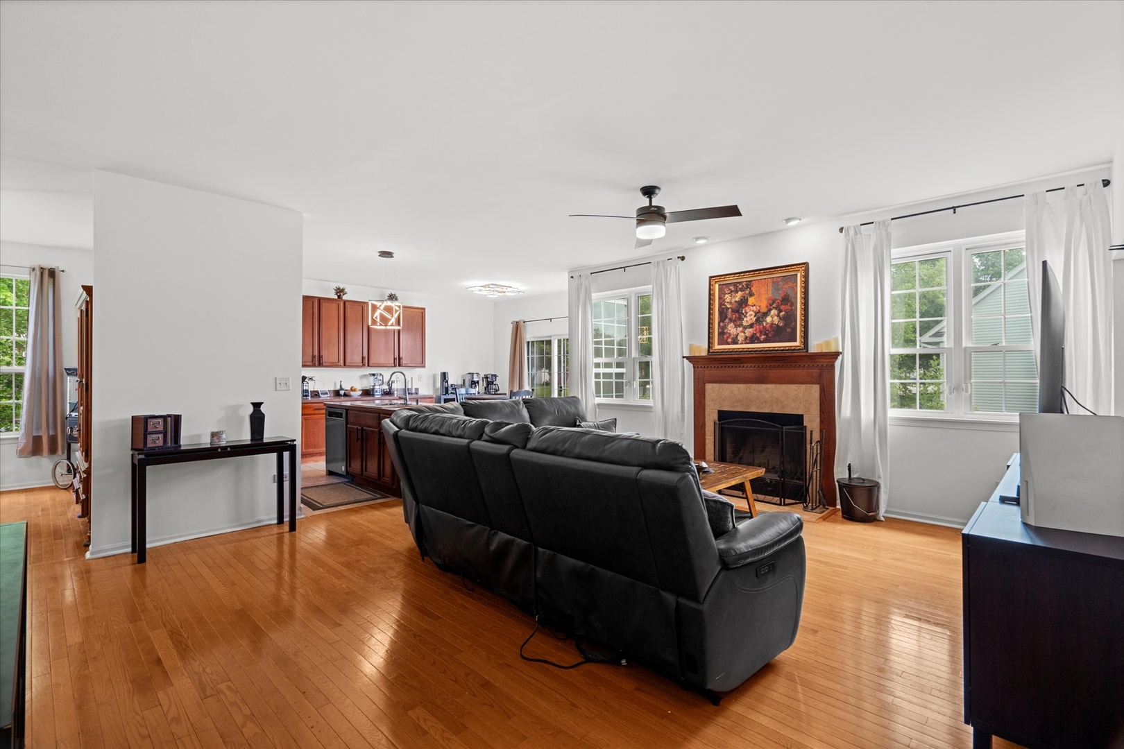 1314 Danhof Drive Bolingbrook, IL 60490 - Photo 11 of 39 a living room with furniture and a fireplace