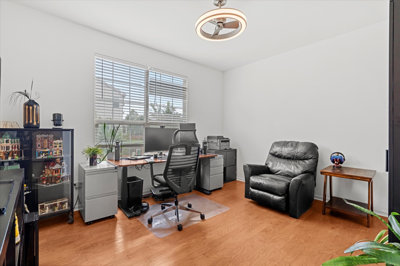 1314 Danhof Drive Bolingbrook, IL 60490 - Photo 12 of 39 a view of a workspace with furniture and a window