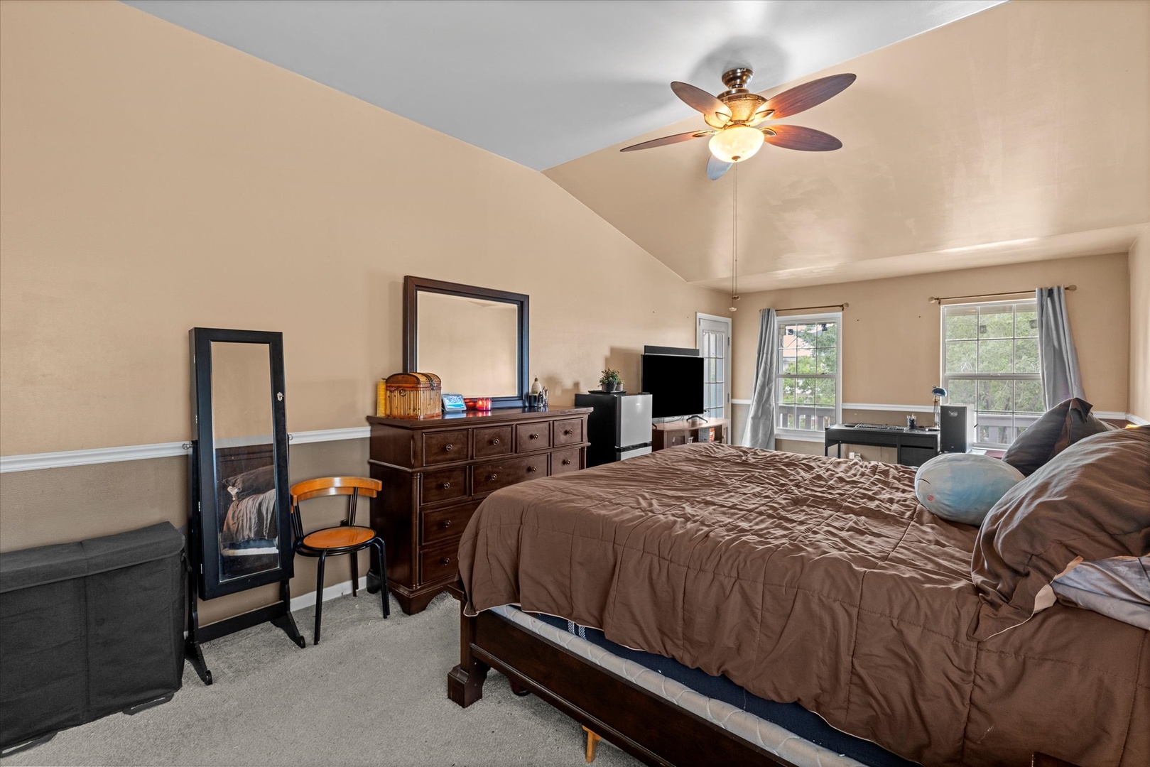 1314 Danhof Drive Bolingbrook, IL 60490 - Photo 21 of 39 a bedroom with a bed and a chandelier