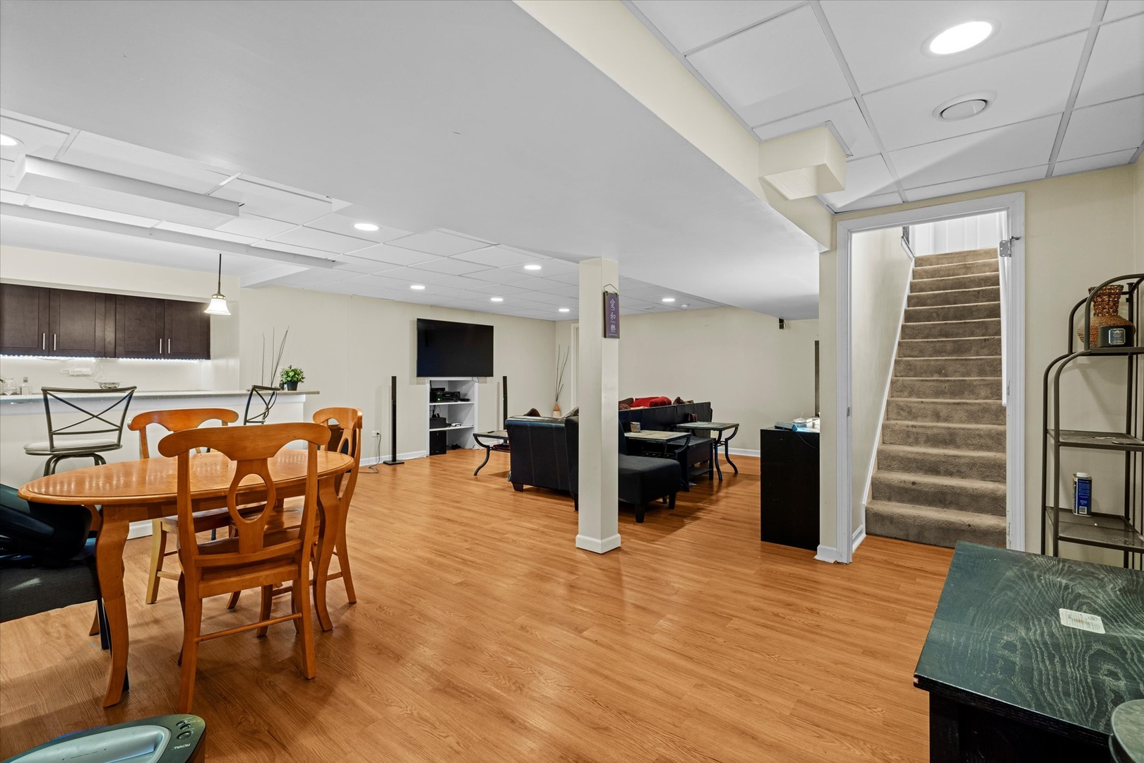 1314 Danhof Drive Bolingbrook, IL 60490 - Photo 25 of 39 a dining room with furniture wooden floor and a rug
