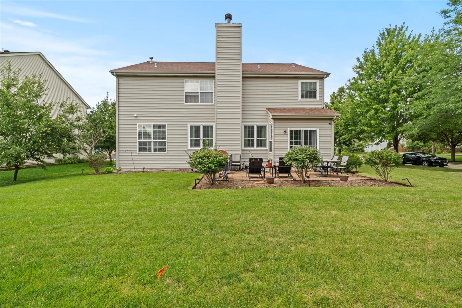 1314 Danhof Drive Bolingbrook, IL 60490 - Photo 28 of 39 a front view of a house with garden and patio