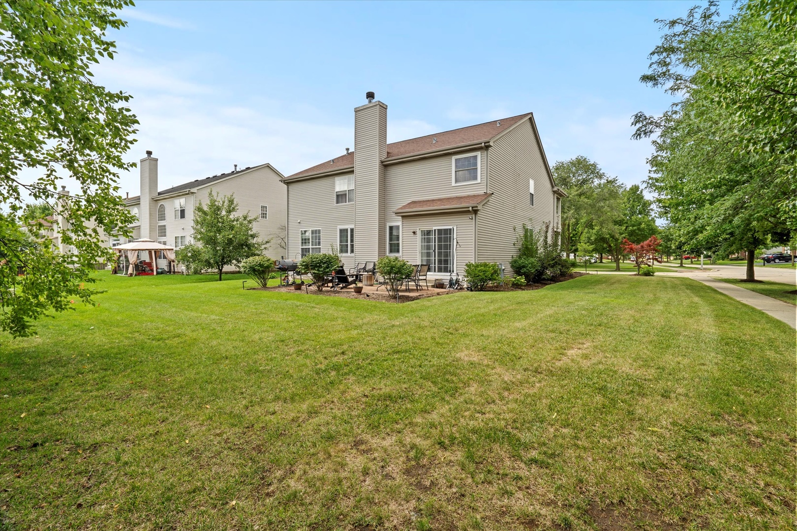 1314 Danhof Drive Bolingbrook, IL 60490 - Photo 29 of 39 a front view of house with yard and trees