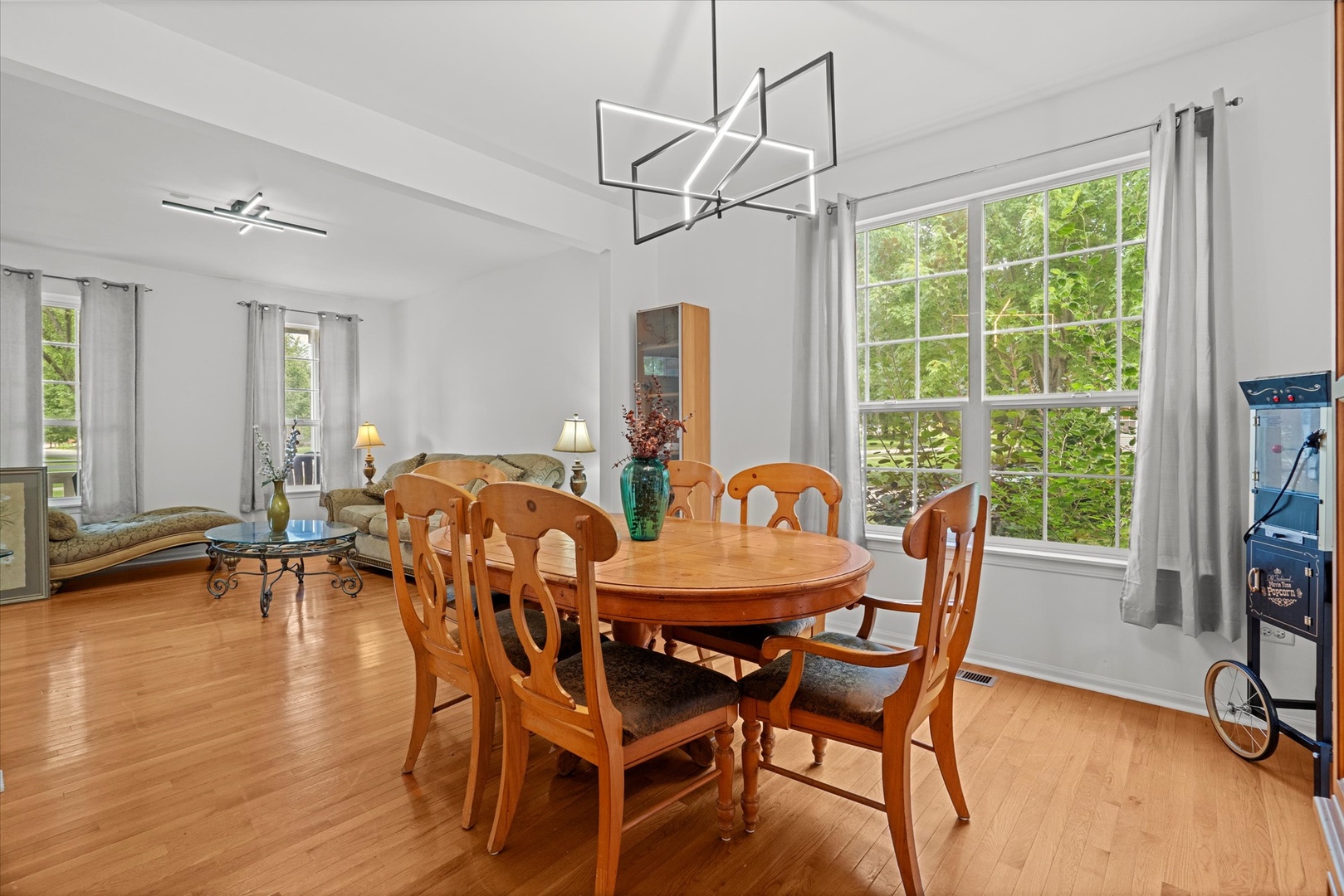 1314 Danhof Drive Bolingbrook, IL 60490 - Photo 5 of 39 a view of a dining room with furniture window and wooden floor