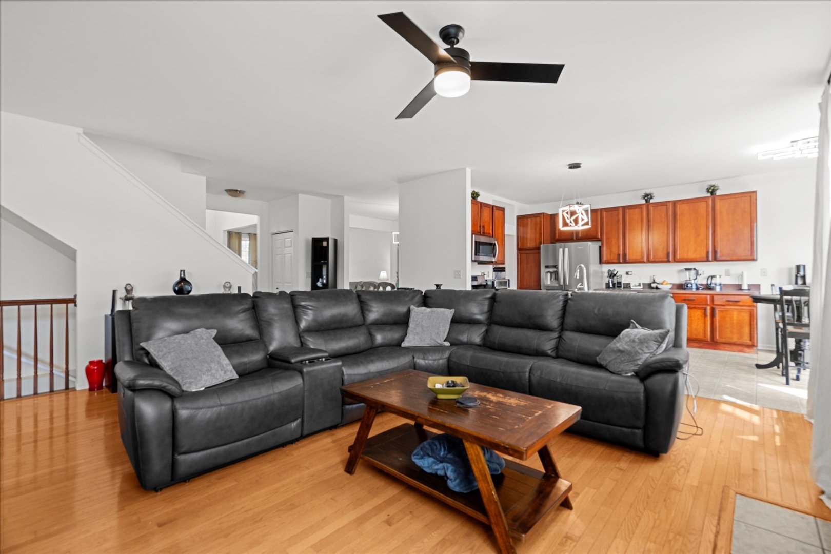 1314 Danhof Drive Bolingbrook, IL 60490 - Photo 9 of 39 a living room with furniture and kitchen view