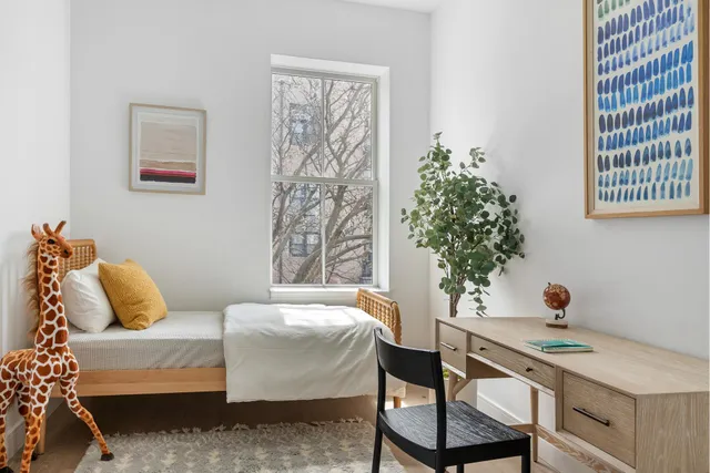 a bathroom with a granite countertop sink a toilet and bathtub