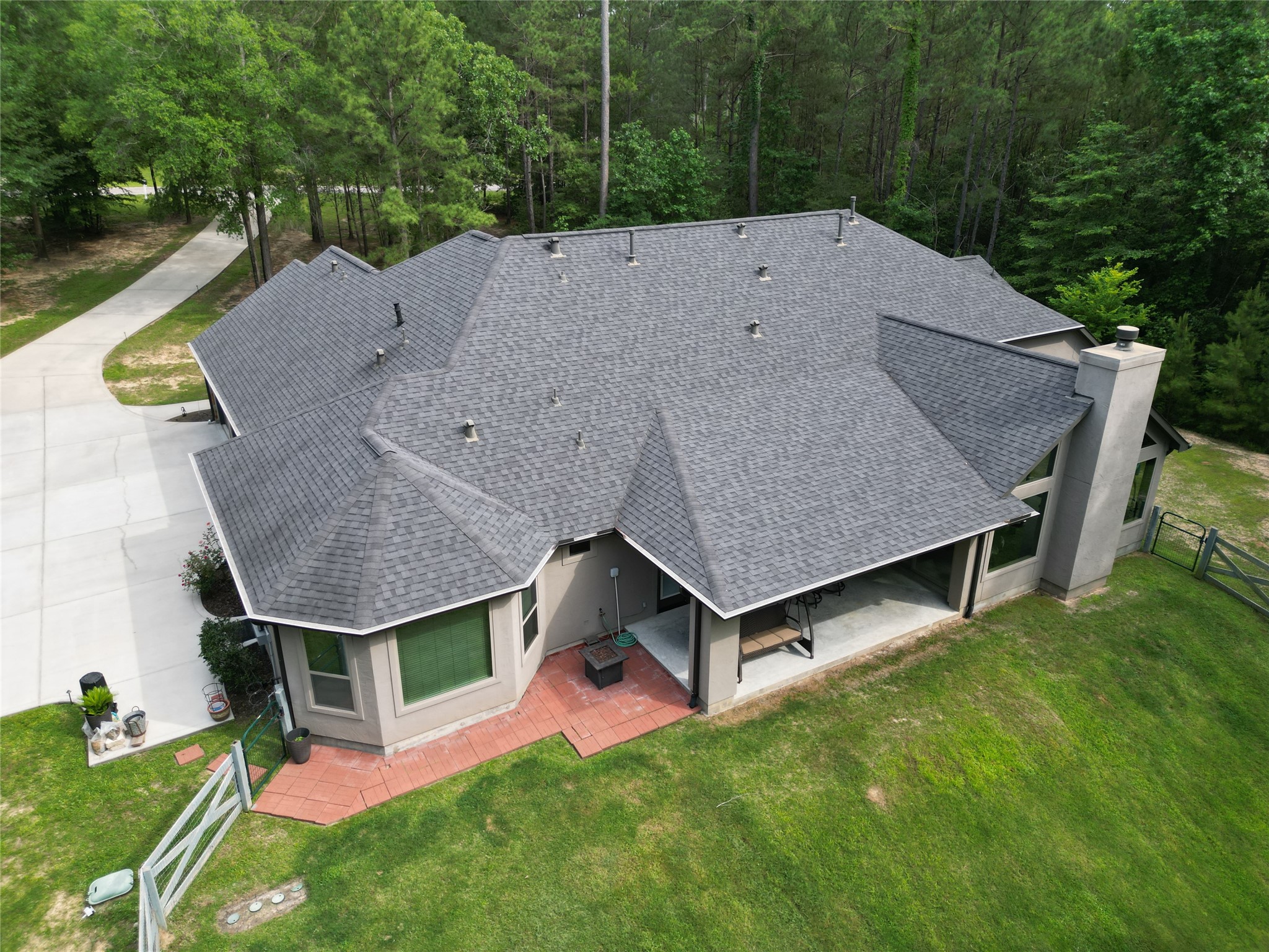 121 Red Hawk Road Huntsville, TX 77340 - Photo 39 of 48 Lots of covered patio space to very private backyard