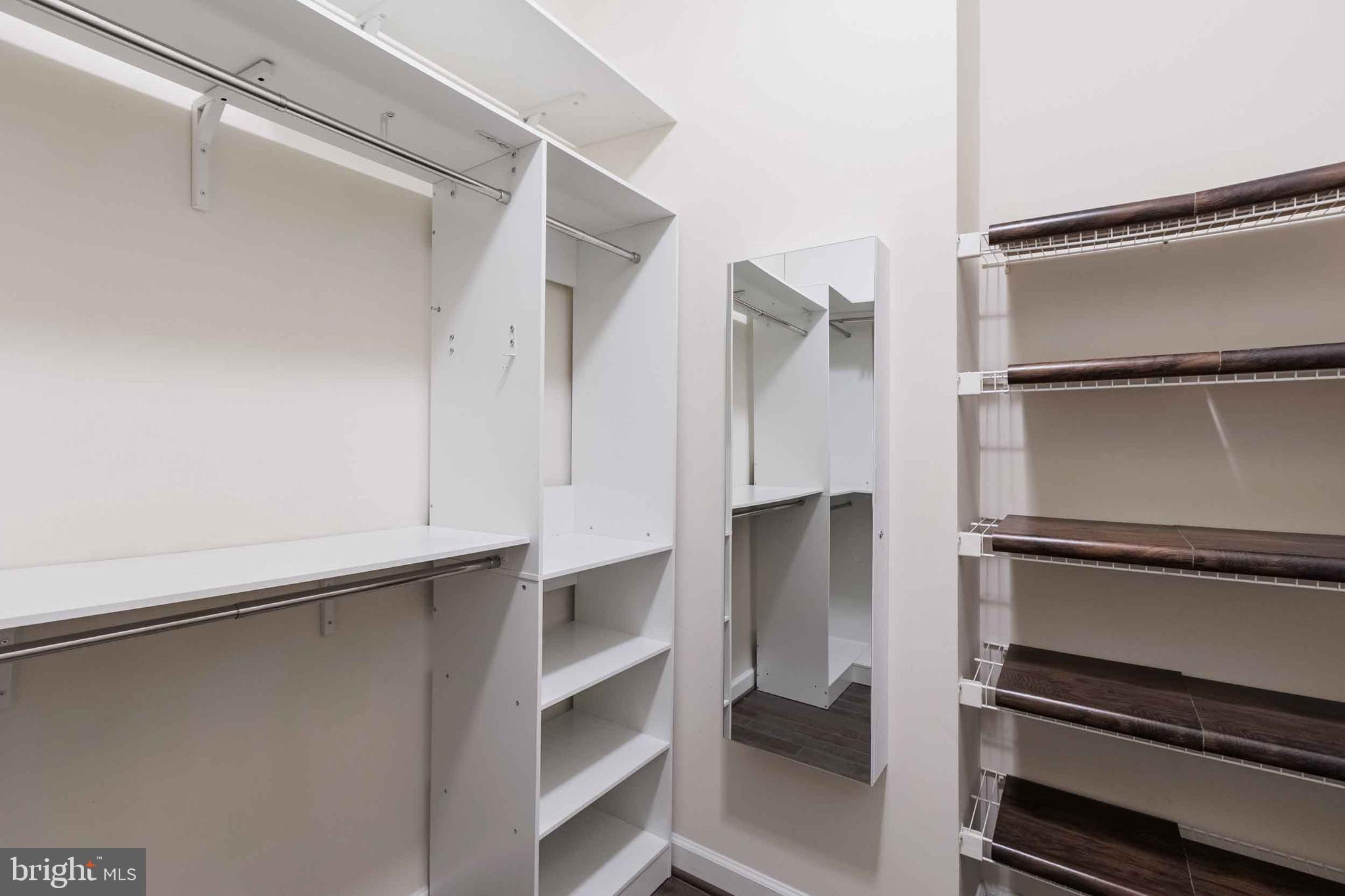 9733 Braidwood Terrace Frederick, MD 21704 - Photo 29 of 33 a view of walk in closet with empty racks
