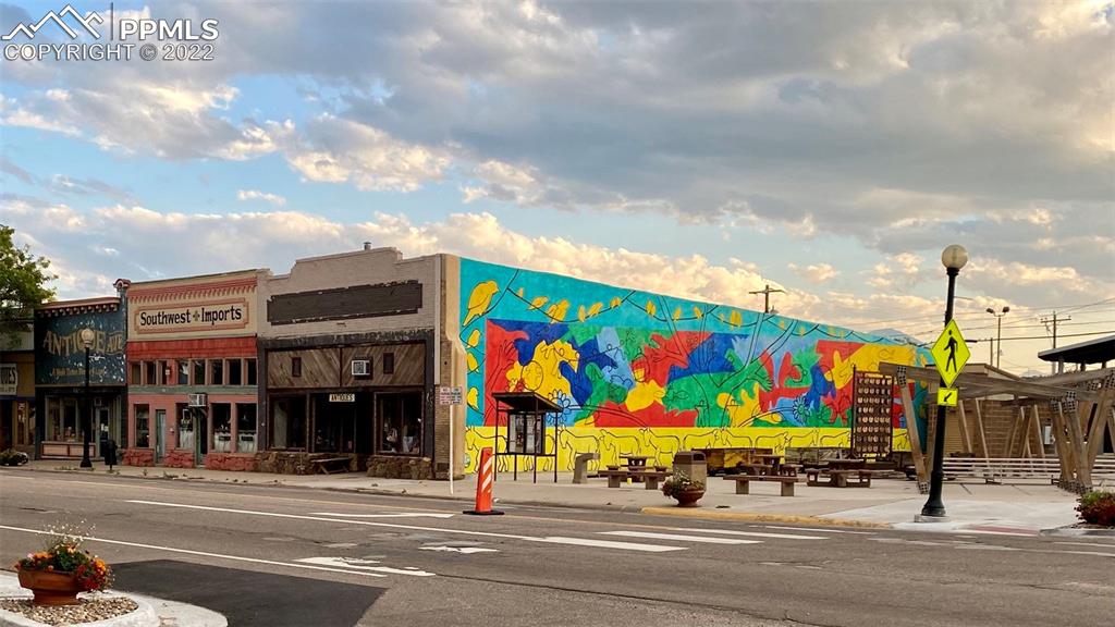 211 West 3rd Street Walsenburg, CO 81089 - Photo 30 of 33 a sign board with the view of building in the background
