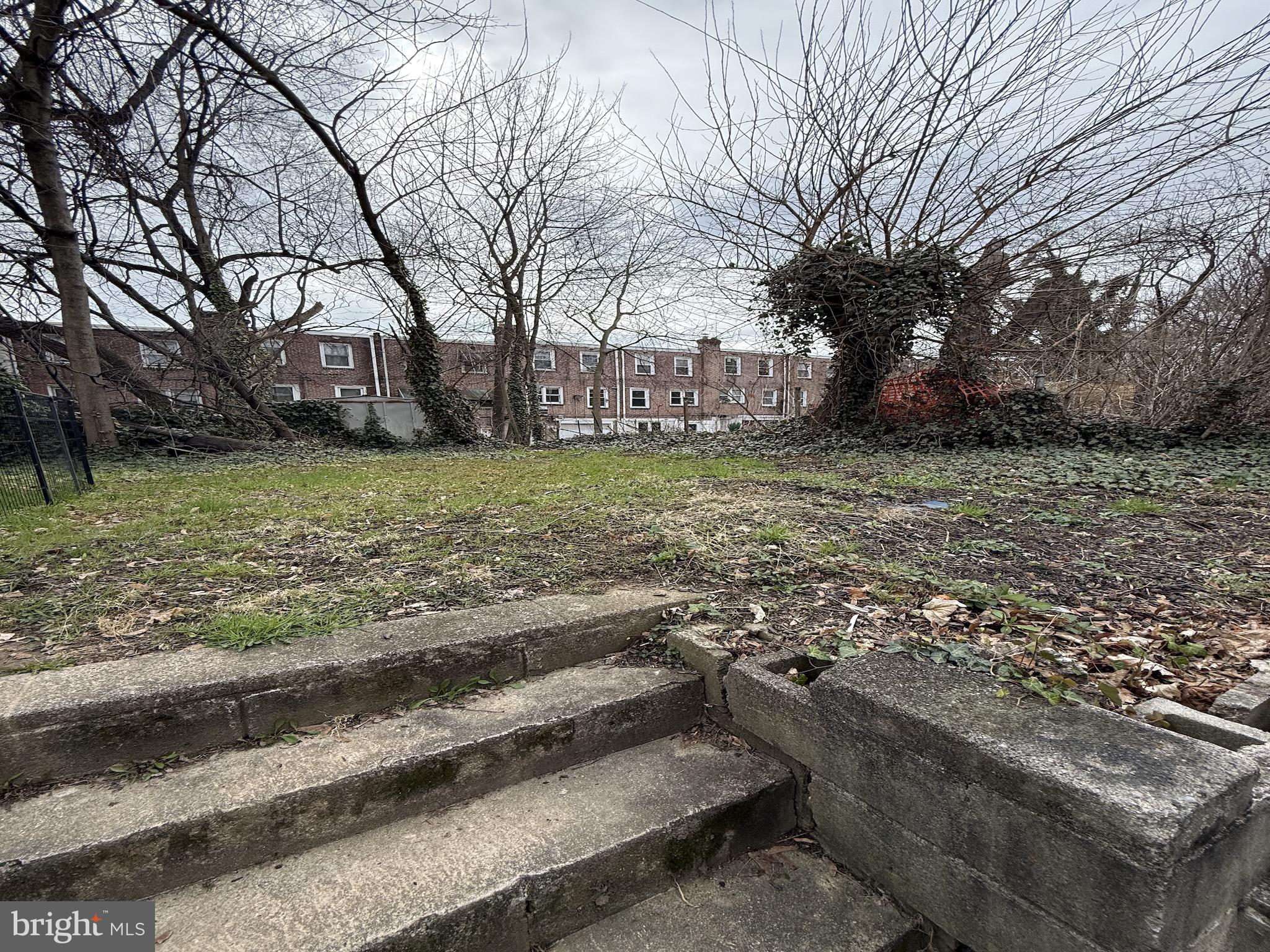 229 West 22nd Street Chester, PA 19013 - Photo 17 of 18 a view of a yard with a tree