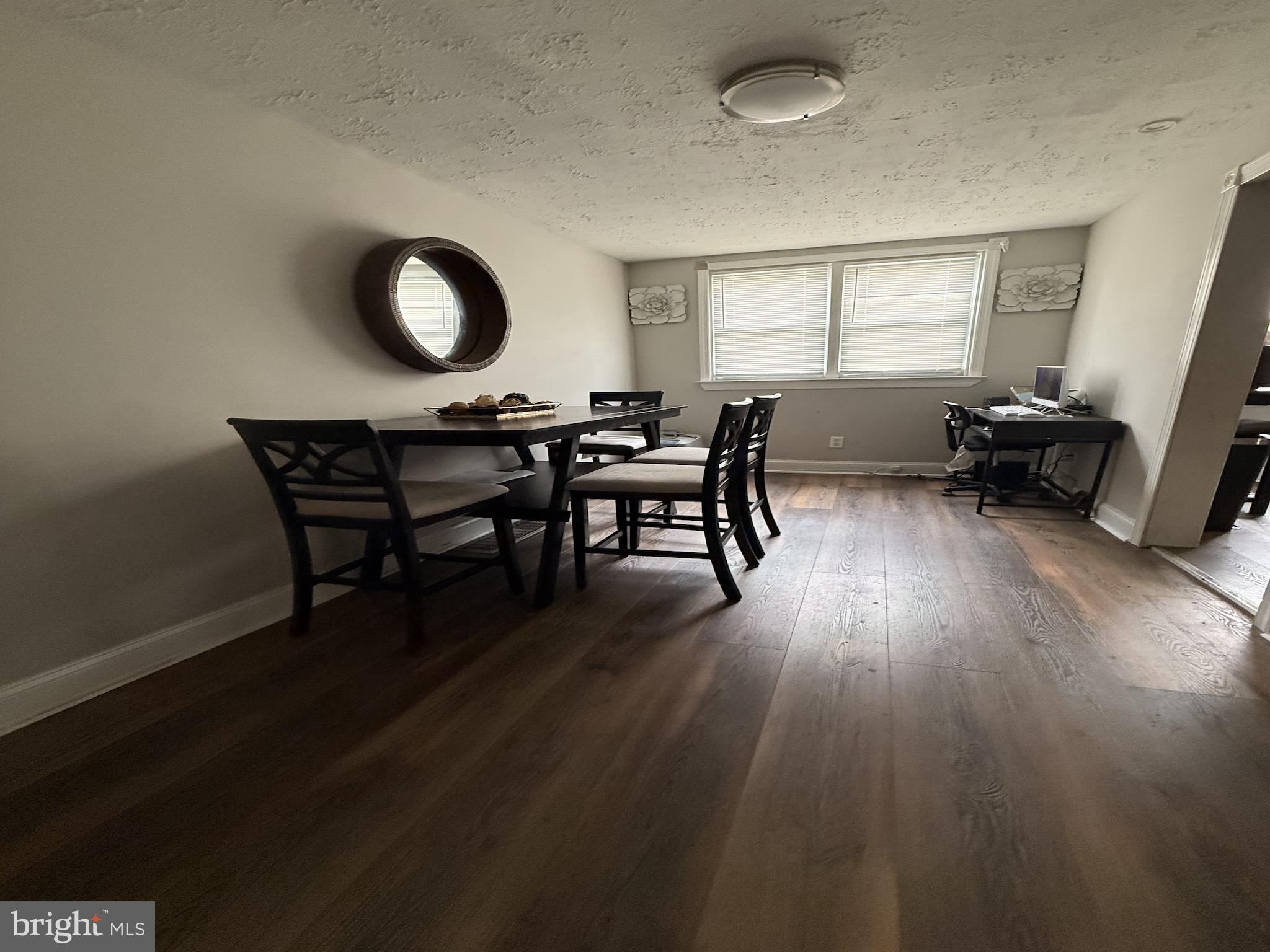229 West 22nd Street Chester, PA 19013 - Photo 3 of 18 a view of a livingroom with furniture and a window