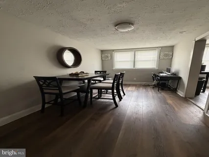 a workspace with wooden floor