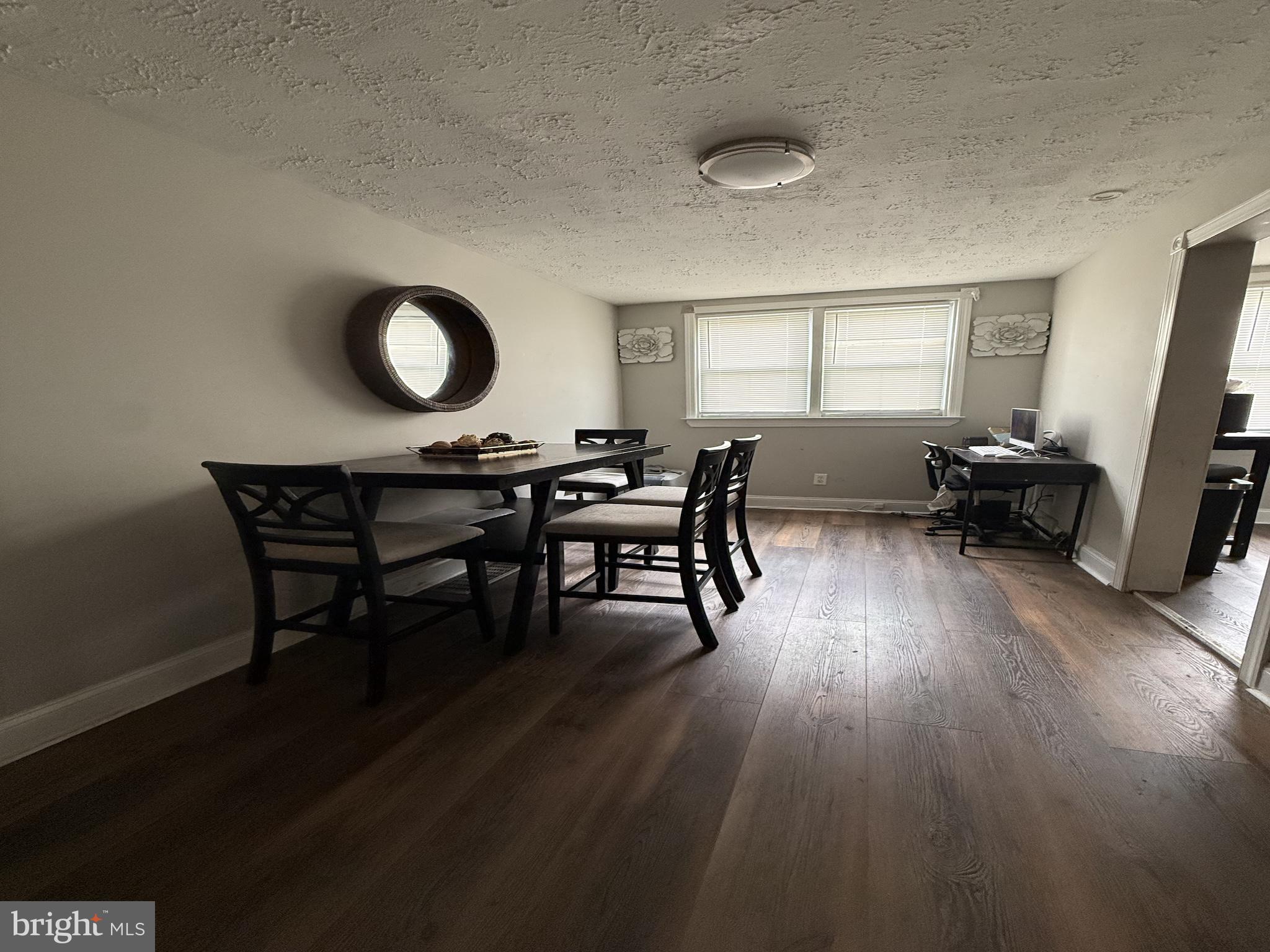 229 West 22nd Street Chester, PA 19013 - Photo 6 of 18 a workspace with wooden floor