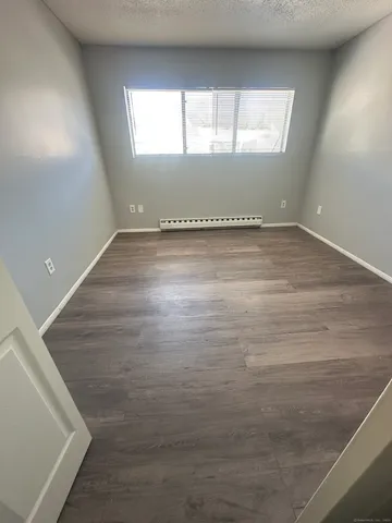 a kitchen with a stove and a sink