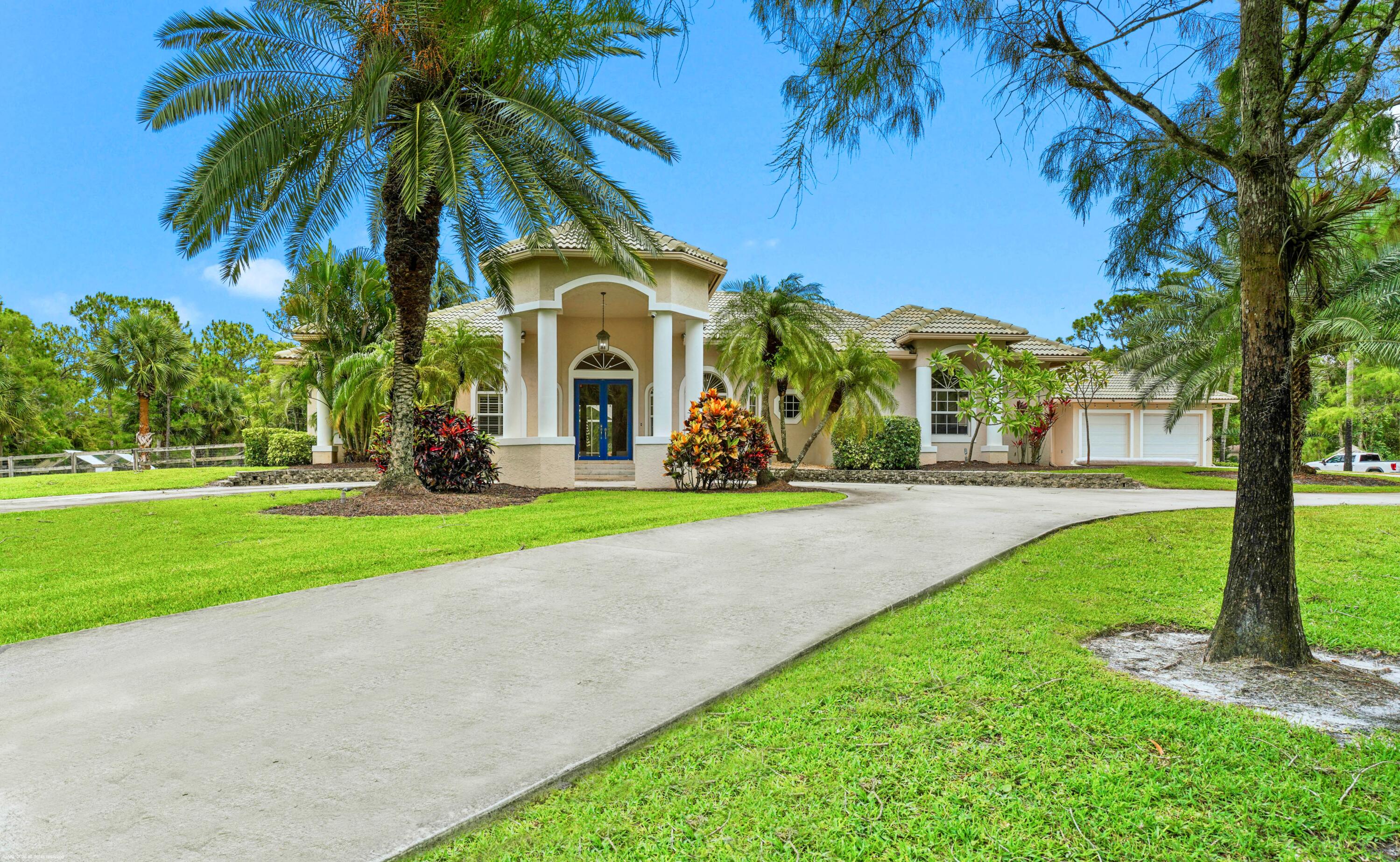 2560 Buck Ridge Trail Loxahatchee, FL 33470 - Photo 5 of 65 Front Elevation of the main residence