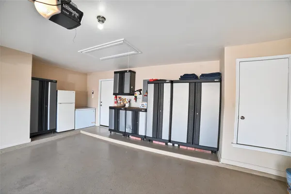 a workspace with furniture and window