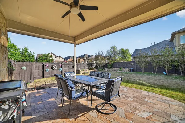 a view of a livingroom with furniture window and wooden floor