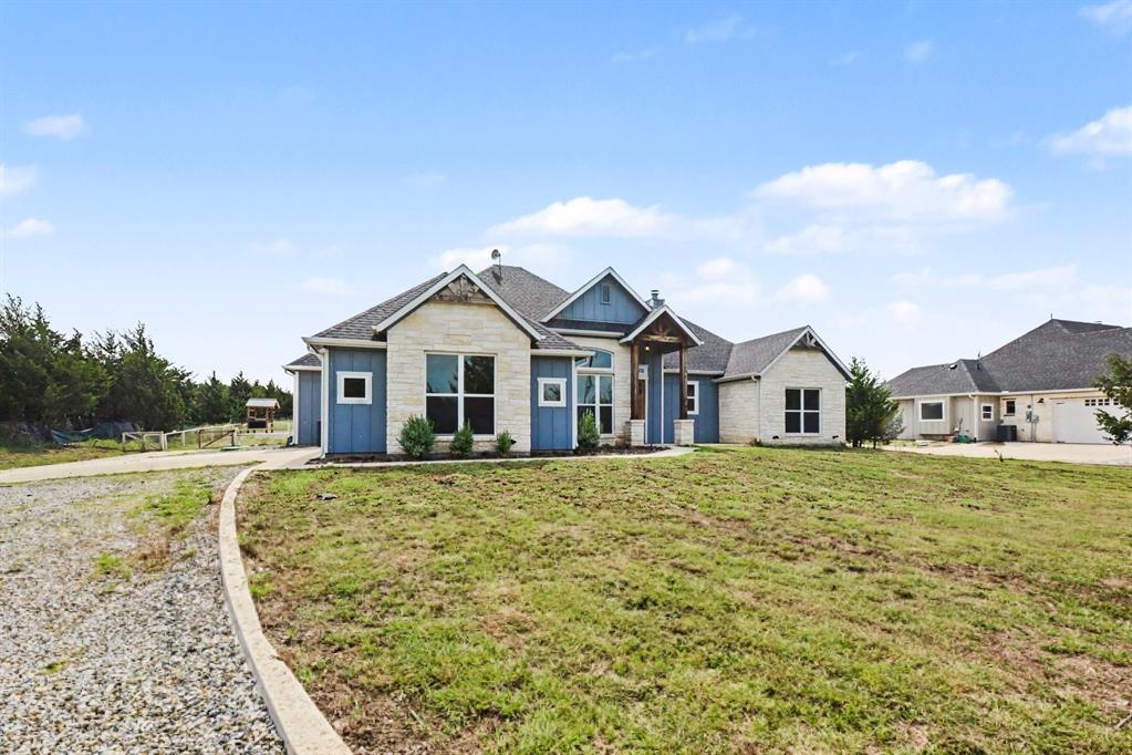 530 P R 491 Leonard, TX 75452 - Photo 3 of 35 Stone and siding exterior with gabled roof lines