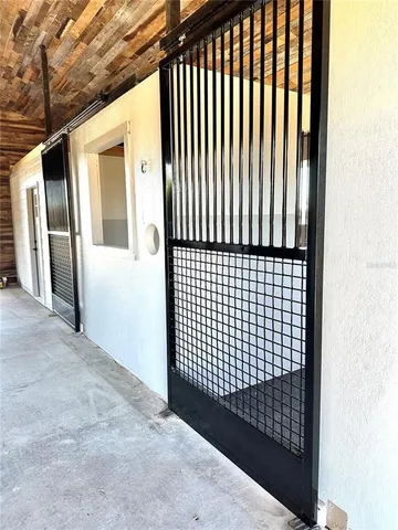 a view of swimming pool with seating area