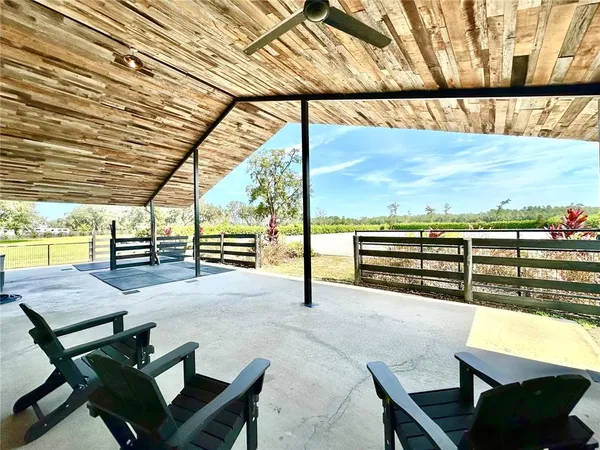 a view of outdoor space with seating area