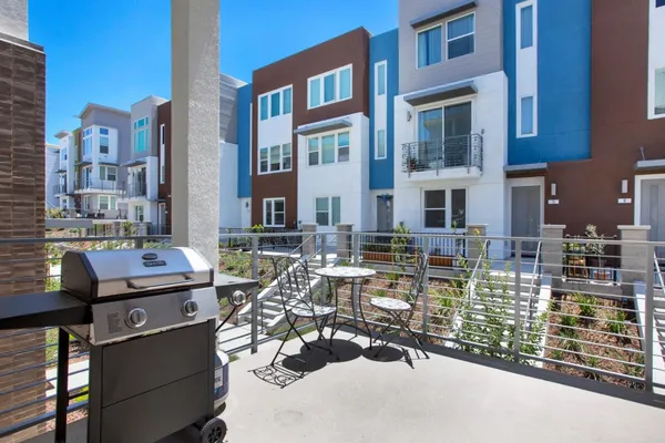 a view of a brick building with many windows