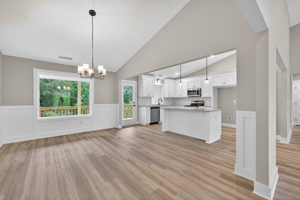 328 Advent Drive Winder, GA 30680 - Photo 15 of 45 a view of a kitchen with microwave and cabinets