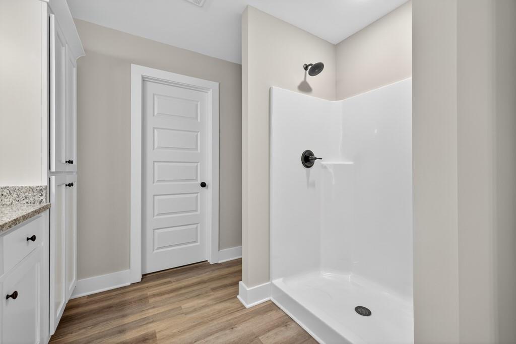 328 Advent Drive Winder, GA 30680 - Photo 21 of 45 a bathroom with a bath tub