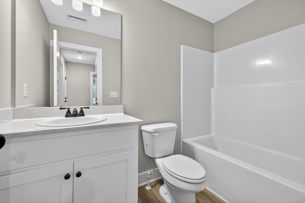 328 Advent Drive Winder, GA 30680 - Photo 26 of 45 a bathroom with a sink toilet and shower