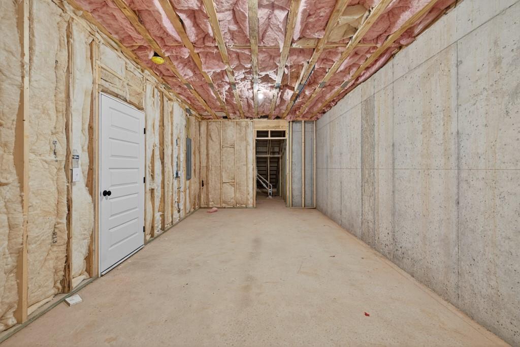 328 Advent Drive Winder, GA 30680 - Photo 39 of 45 a view of a hallway with wooden walls