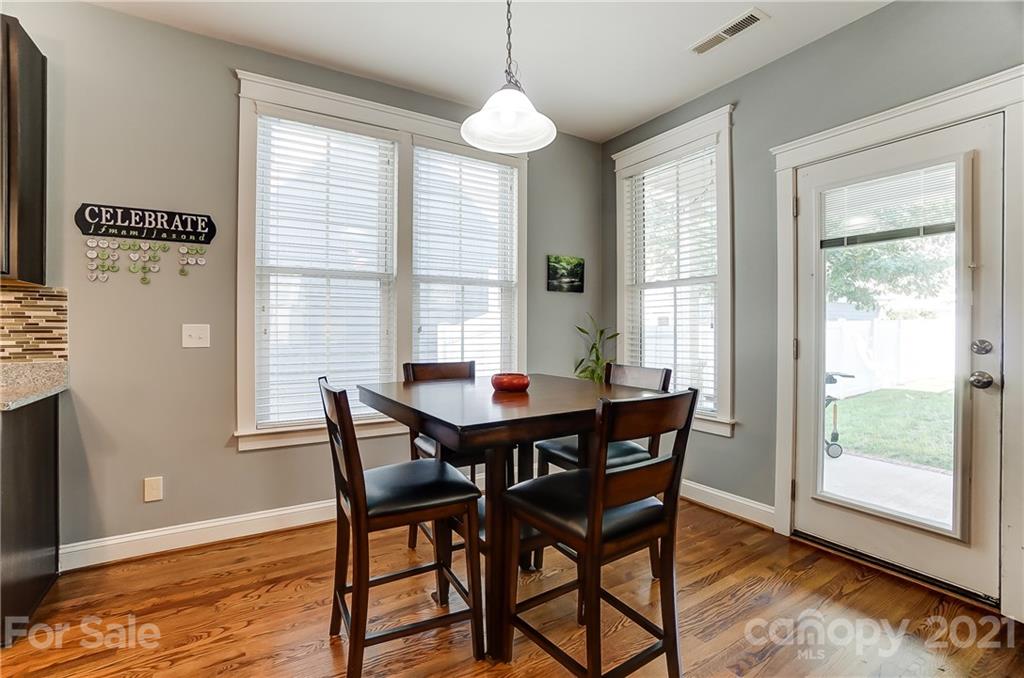 3555 Richard's Crossing Fort Mill, SC 29708 - Photo 15 of 37 a dining room with furniture window wooden floor