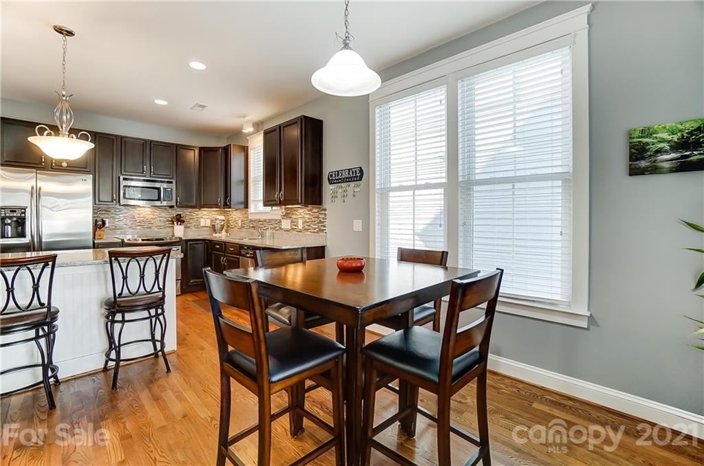 3555 Richard's Crossing Fort Mill, SC 29708 - Photo 17 of 37 a dining table & chairs in a room