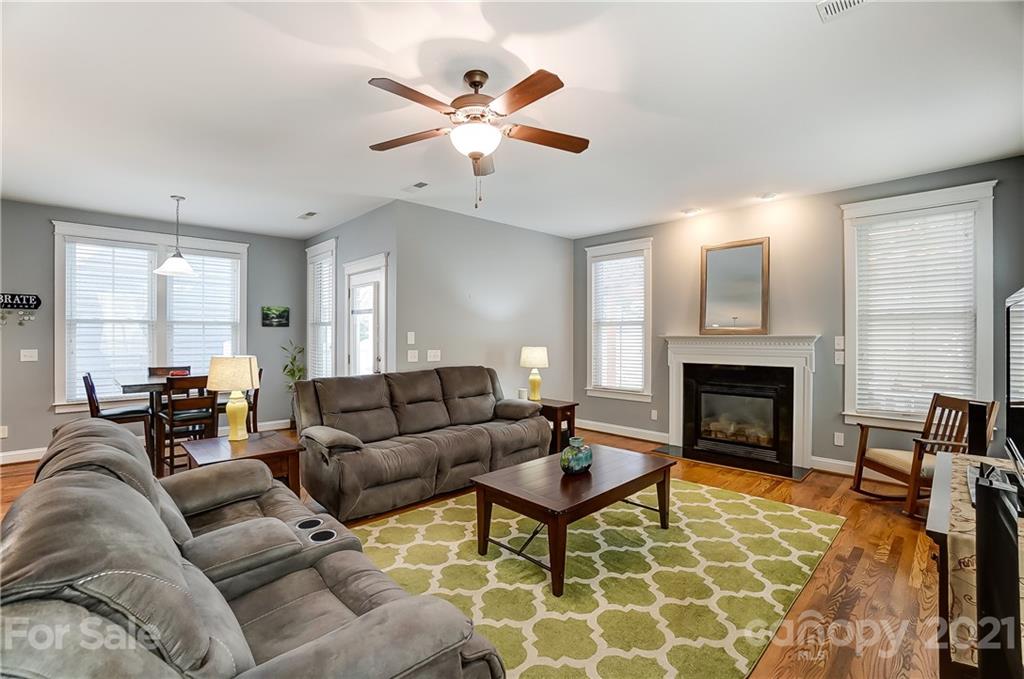 3555 Richard's Crossing Fort Mill, SC 29708 - Photo 19 of 37 a living room with furniture a fireplace and a window