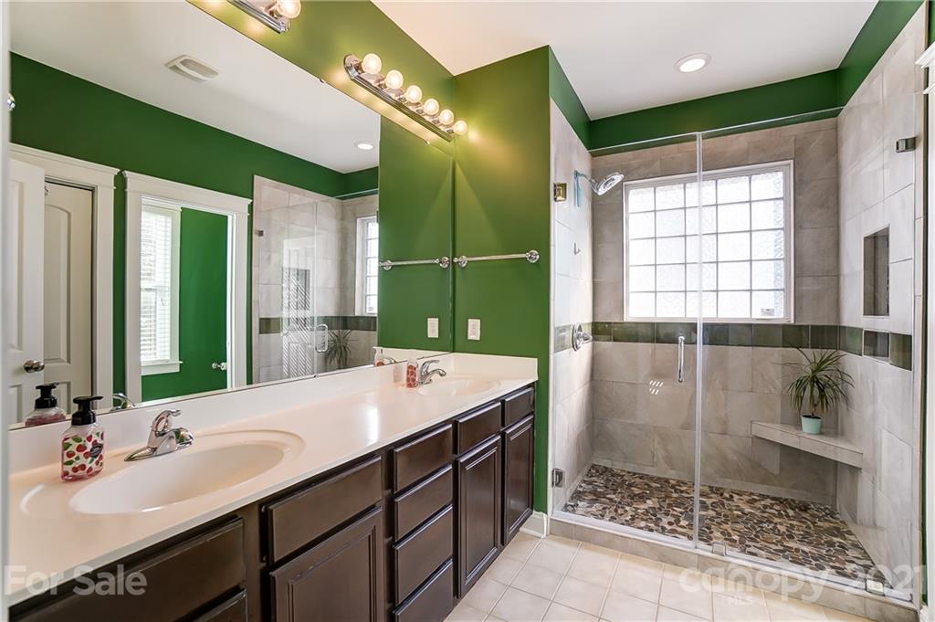 3555 Richard's Crossing Fort Mill, SC 29708 - Photo 25 of 37 a bathroom with a double vanity sink mirror and shower