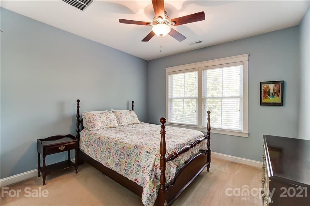 3555 Richard's Crossing Fort Mill, SC 29708 - Photo 26 of 37 a bed sitting in a bedroom next to a window