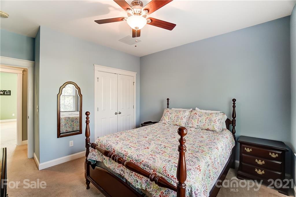 3555 Richard's Crossing Fort Mill, SC 29708 - Photo 27 of 37 a bed sitting in a bedroom next to a window
