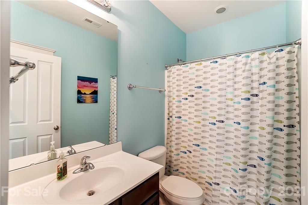 3555 Richard's Crossing Fort Mill, SC 29708 - Photo 28 of 37 a bathroom with a sink and a mirror