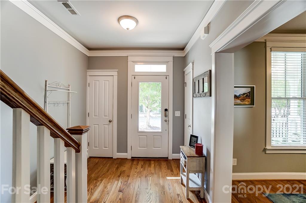 3555 Richard's Crossing Fort Mill, SC 29708 - Photo 4 of 37 a view of an entryway with wooden floor and stairs