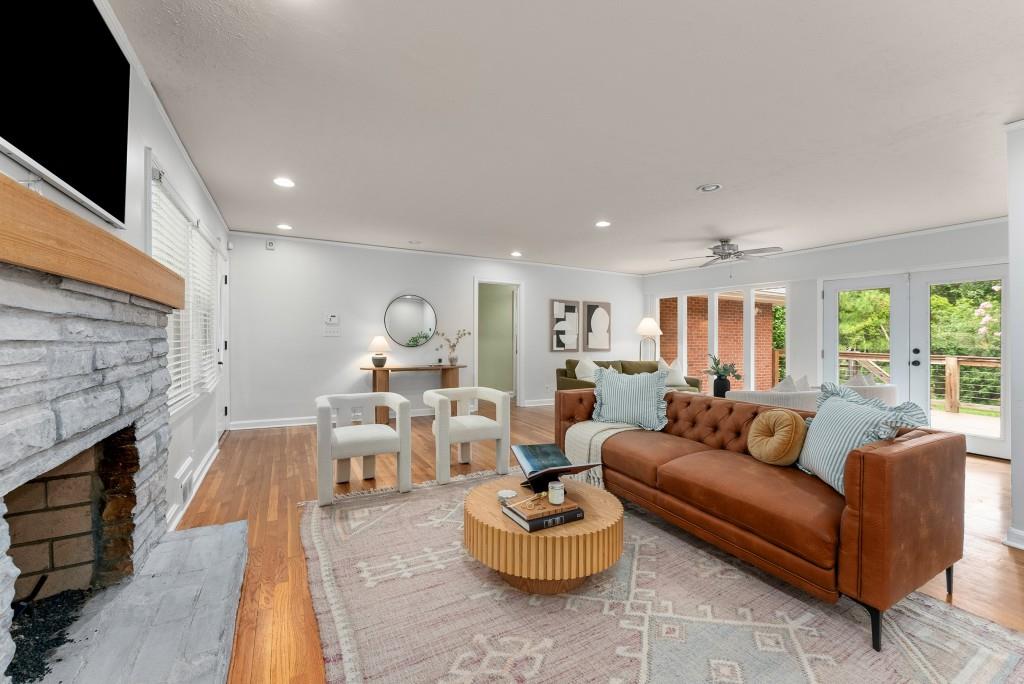 1865 Briarlake Circle Decatur, GA 30033 - Photo 11 of 32 a living room with furniture and a fireplace