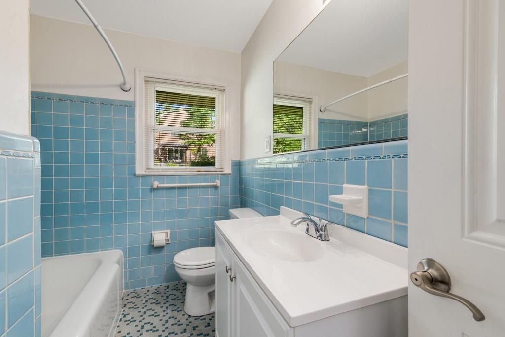 1865 Briarlake Circle Decatur, GA 30033 - Photo 22 of 32 a bathroom with a sink toilet and shower
