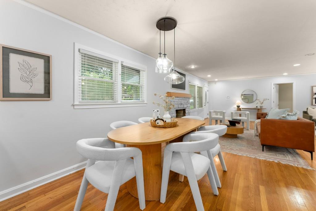 1865 Briarlake Circle Decatur, GA 30033 - Photo 5 of 32 a view of a dining room with furniture and a chandelier