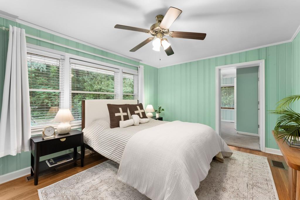 1865 Briarlake Circle Decatur, GA 30033 - Photo 6 of 32 a bedroom with a large bed and a window