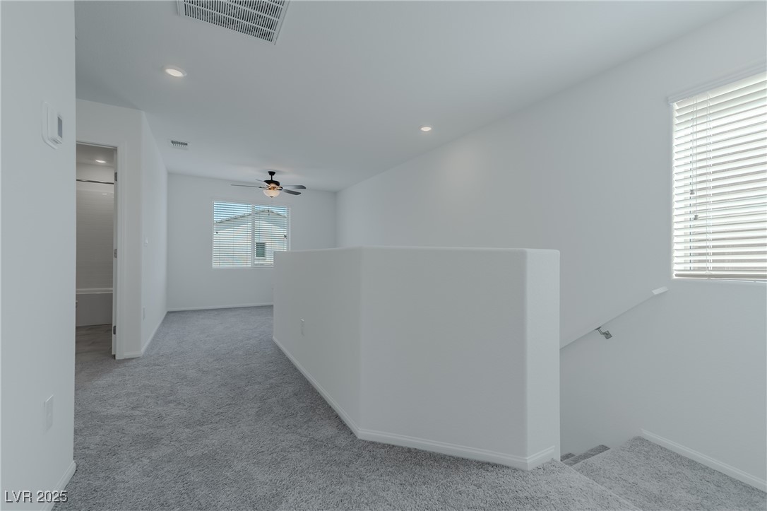 7859 Lacemaker Court Las Vegas, NV 89113 - Photo 18 of 24 Corridor with an upstairs landing, carpet flooring, and recessed lighting
