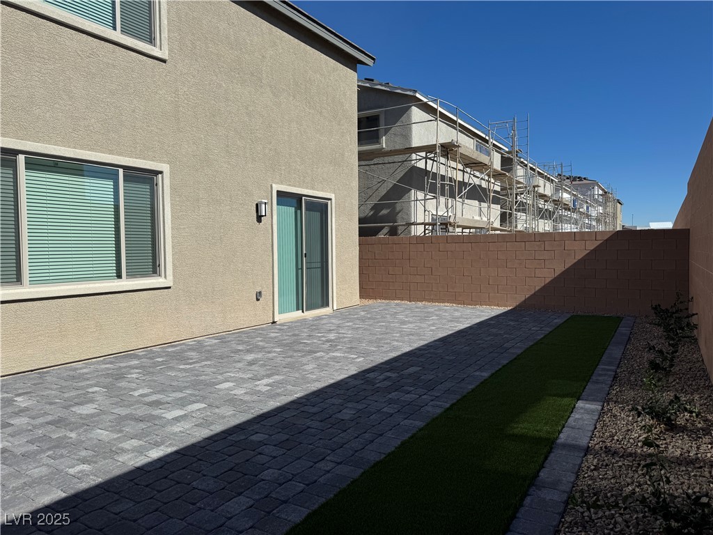 7859 Lacemaker Court Las Vegas, NV 89113 - Photo 20 of 24 Fenced backyard featuring a patio area