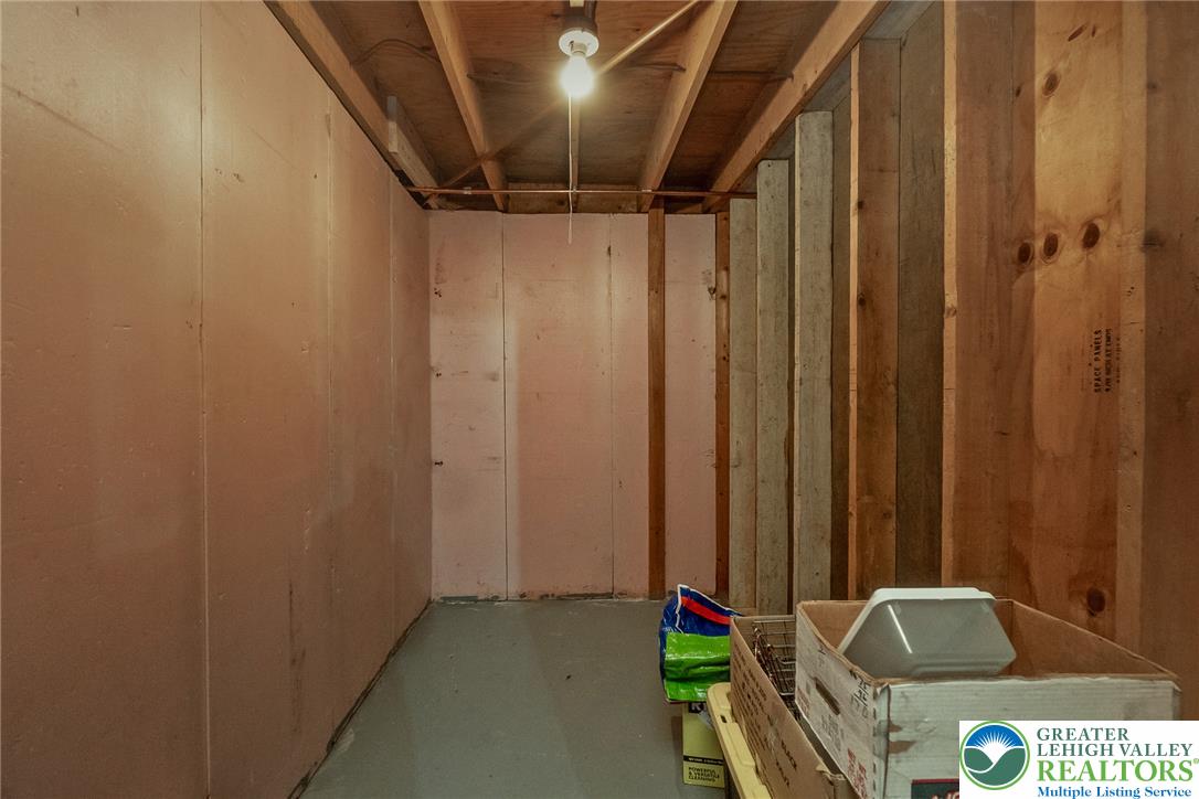 5728 Pheasant Road Bethlehem, PA 18017 - Photo 37 of 39 Unfinished storage space showcases raw timber framing and solid concrete floors.