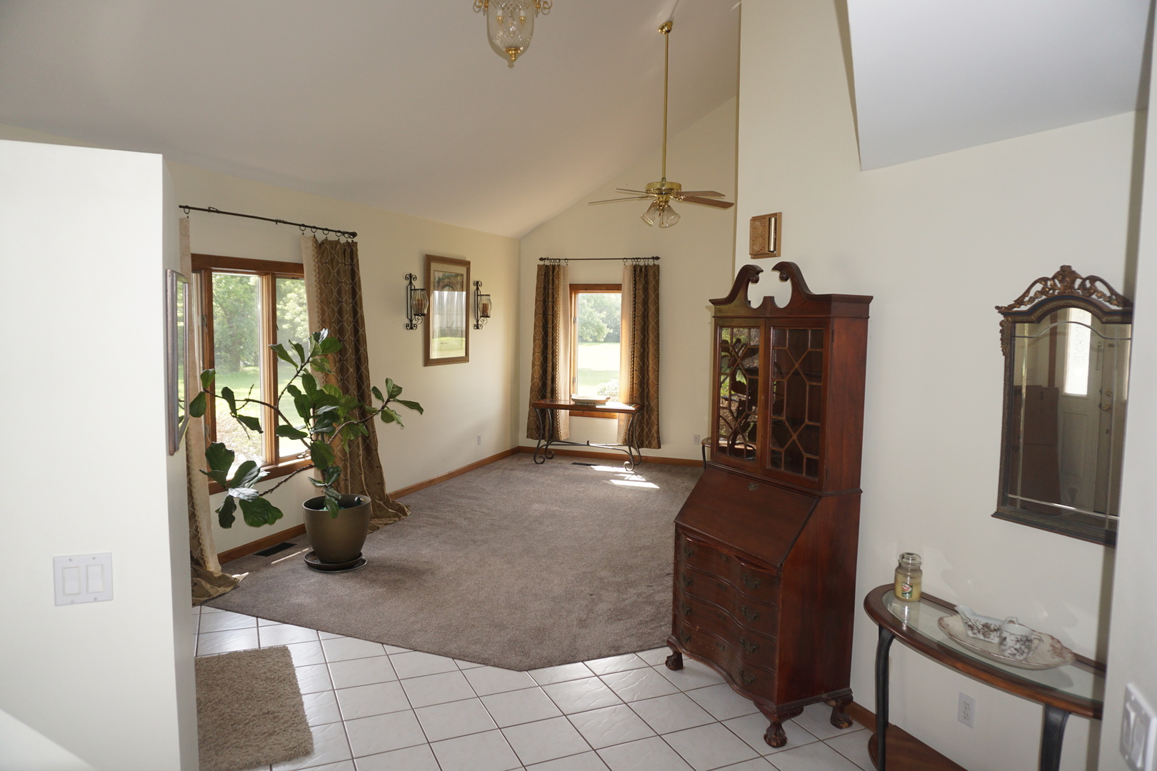 4914 Highway 113 Kankakee, IL 60901 - Photo 13 of 54 a view of a livingroom with furniture and a flat screen tv